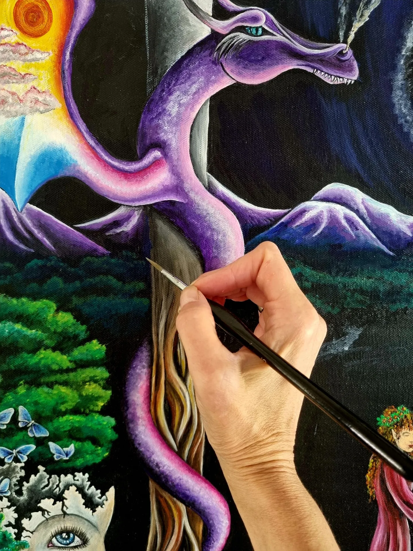 artist's hand painting a purple dragon tarot card in acrylic