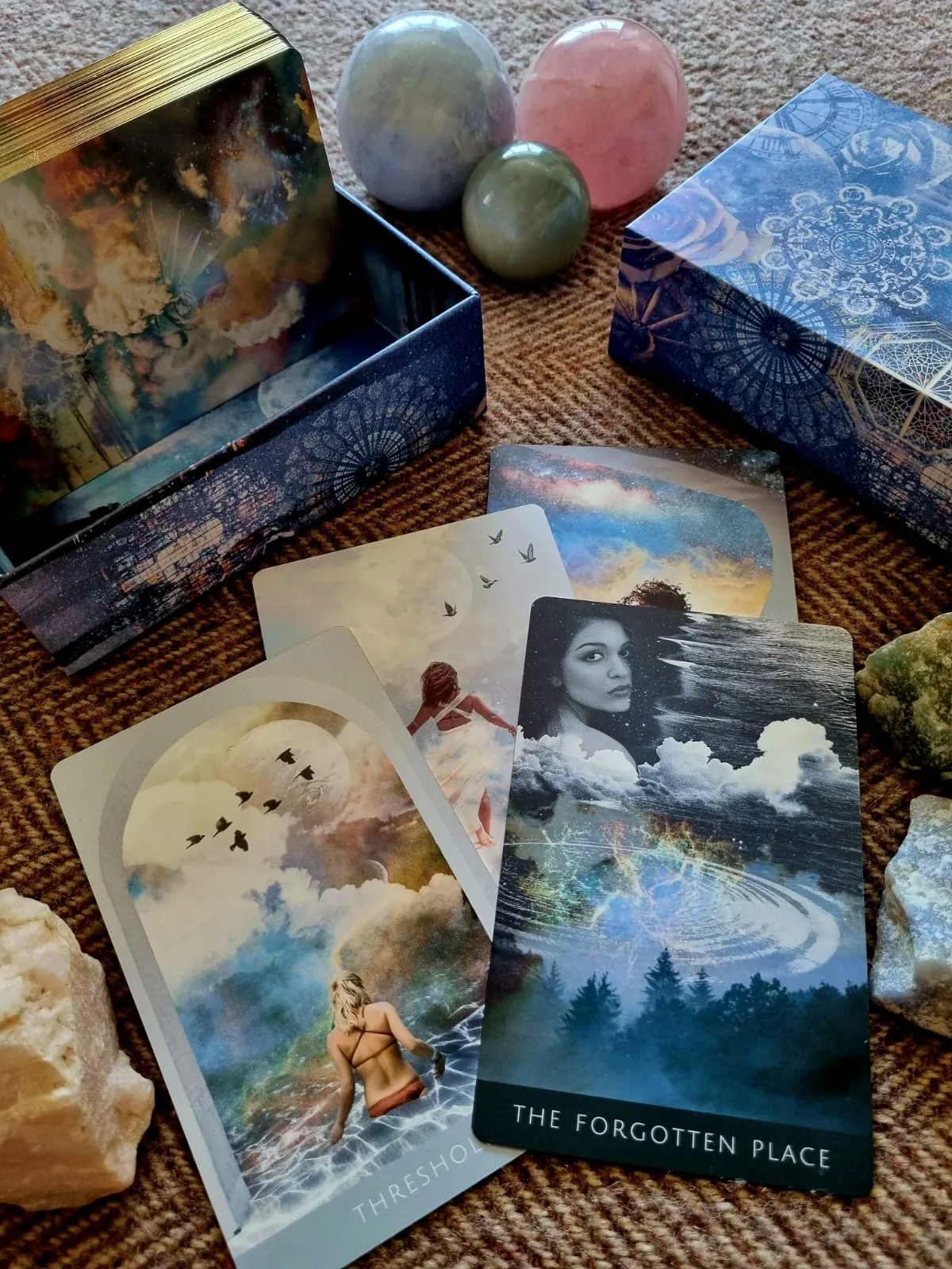 The Forgotten Place and Threshold cards from the Deep Place Oracle with crystals