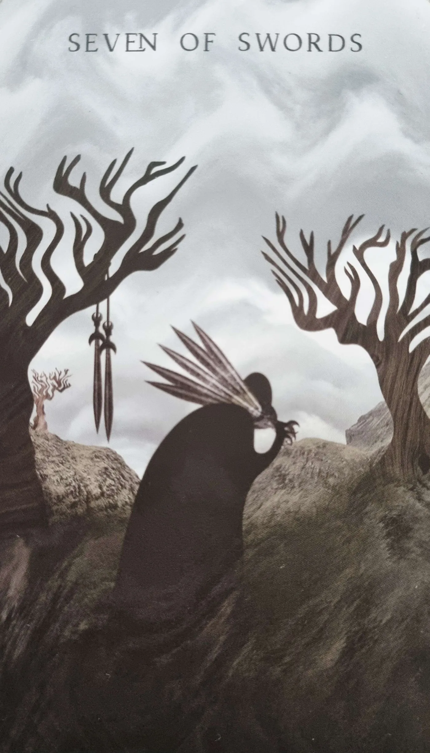 The Seven of Swords tarot card, a figure stealing away with swords, illustrating denial