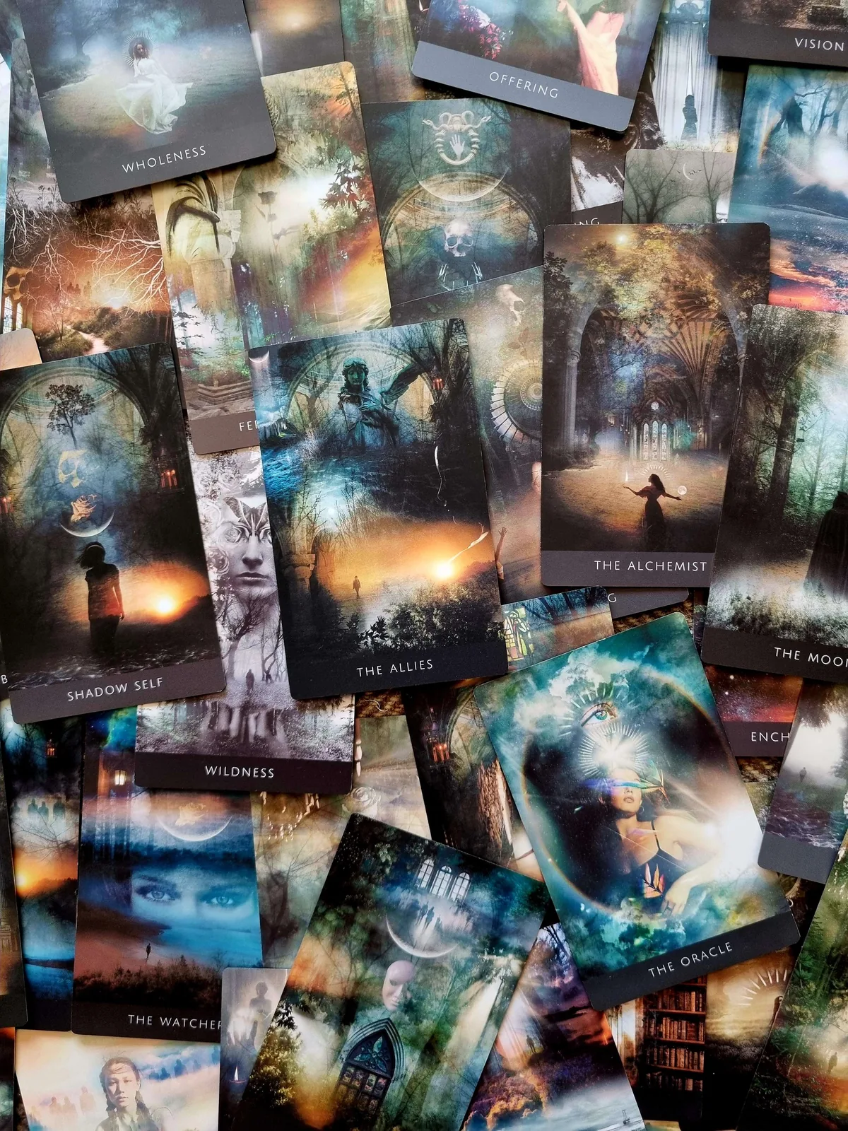 Stone + Shadow Oracle cards fanned out in a scattered spread