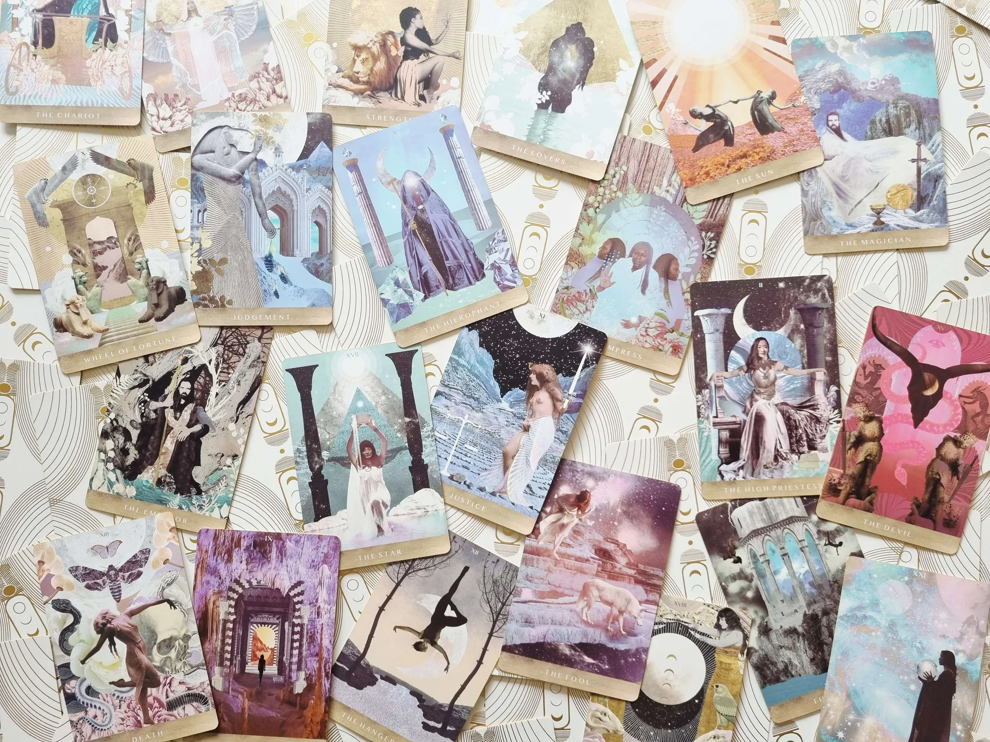 Major arcana cards from the Moonchild Tarot spread out on the gold patterned card backs
