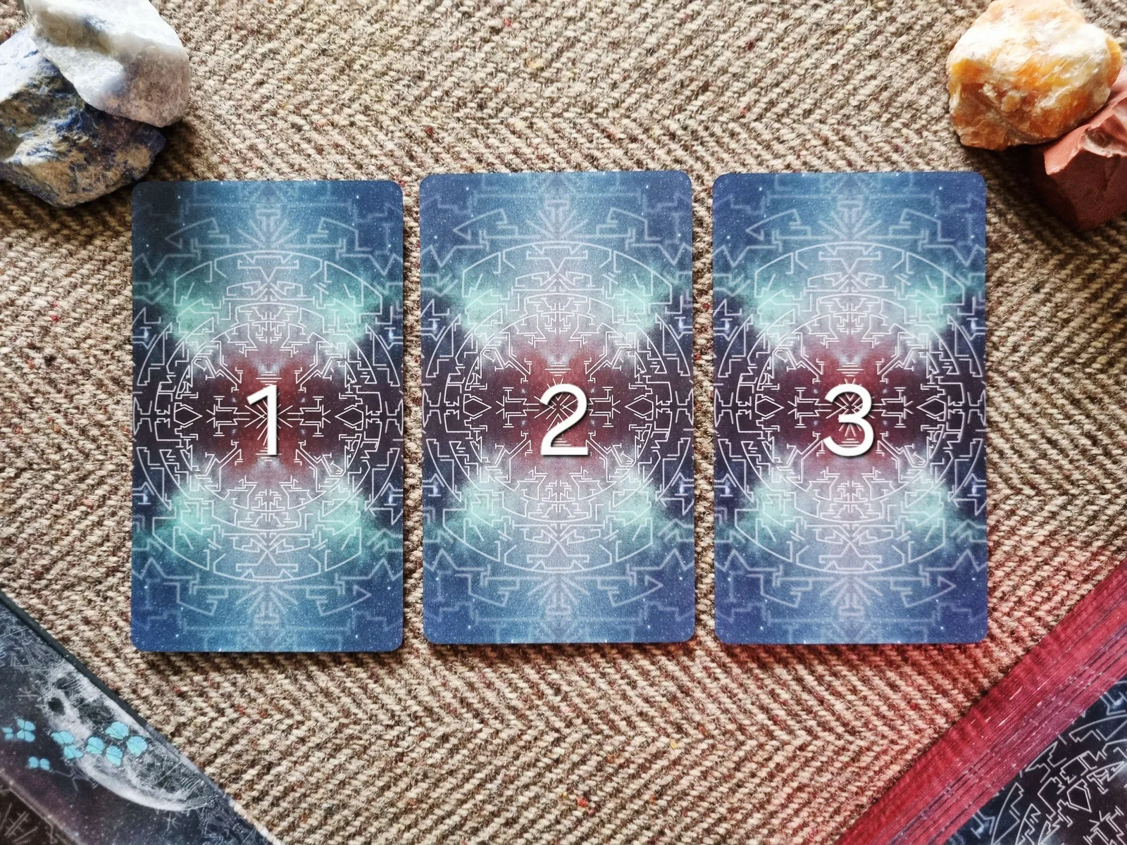 three numbered Cosmosis Tarot card backs laid out for a simple Samhain tarot spread