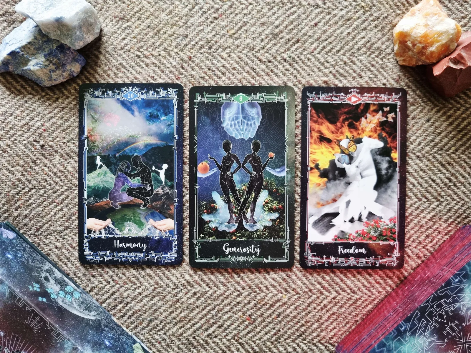 Cosmosis Tarot cards Harmony, Generosity and Freedom turned over in a three-card Samhain reading