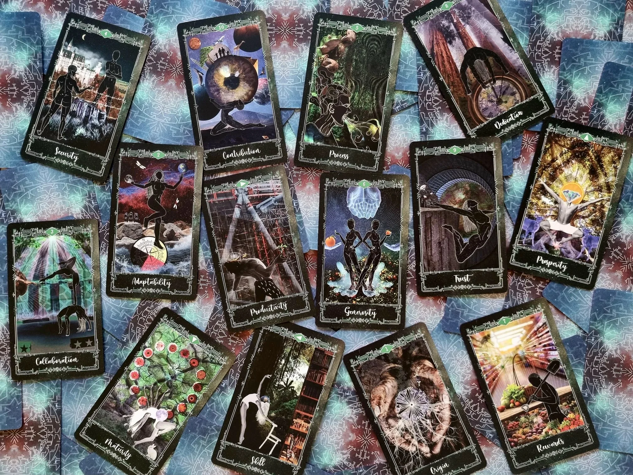 The full Suit of Pentacles from the Cosmosis Tarot scattered together
