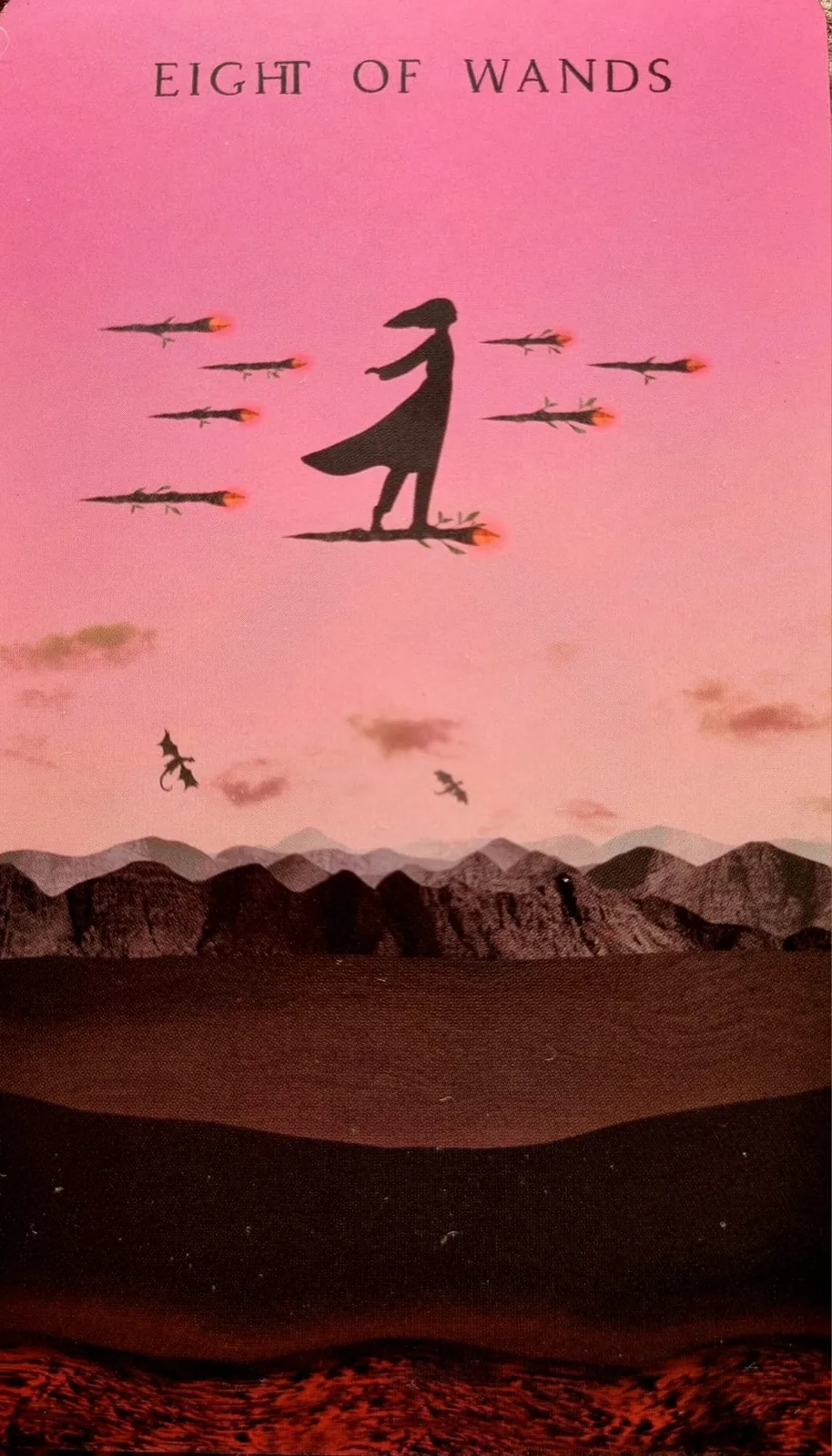 Eight of Wands tarot card, a figure beneath eight flaming arrows in a pink sky