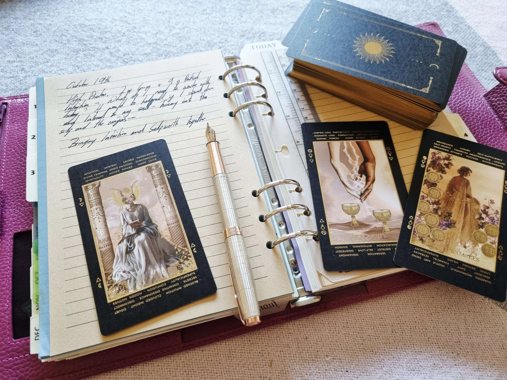 A handwritten daily Tarot journal entry beside the High Priestess, Two of Cups and Nine of Pentacles cards