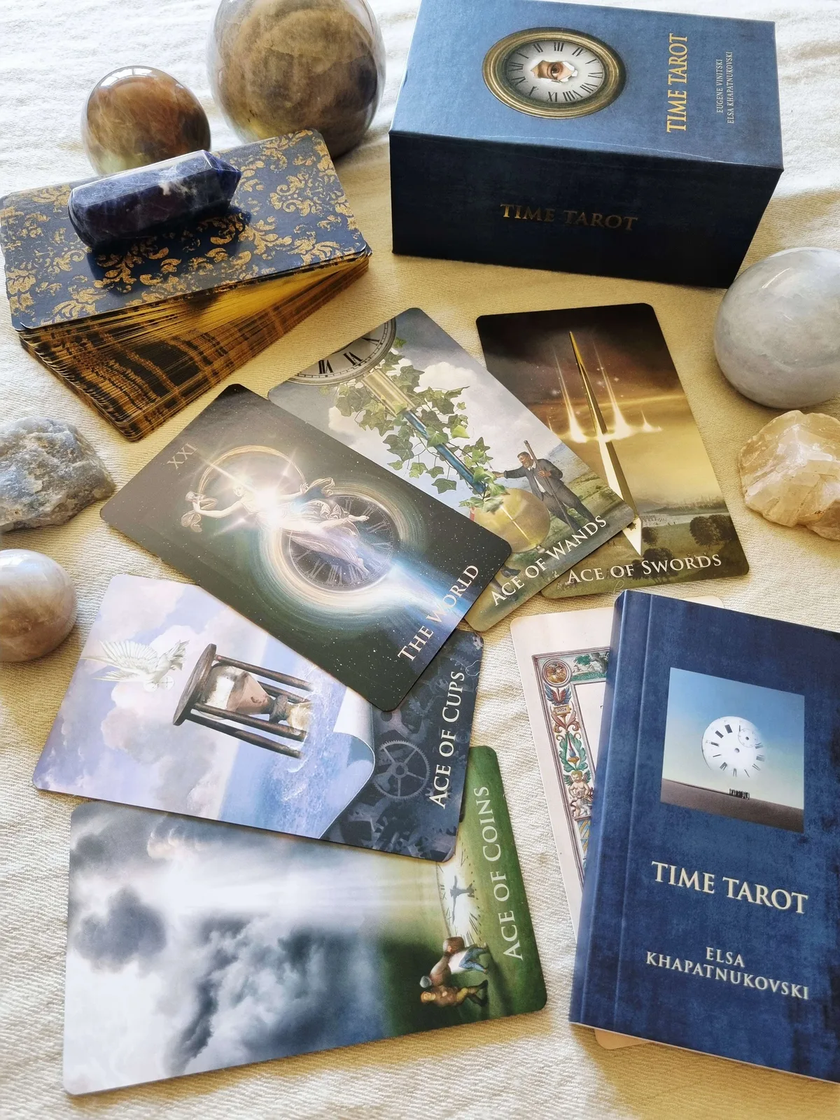 Time Tarot box and blue companion book with the four Aces fanned beside a sodalite crystal